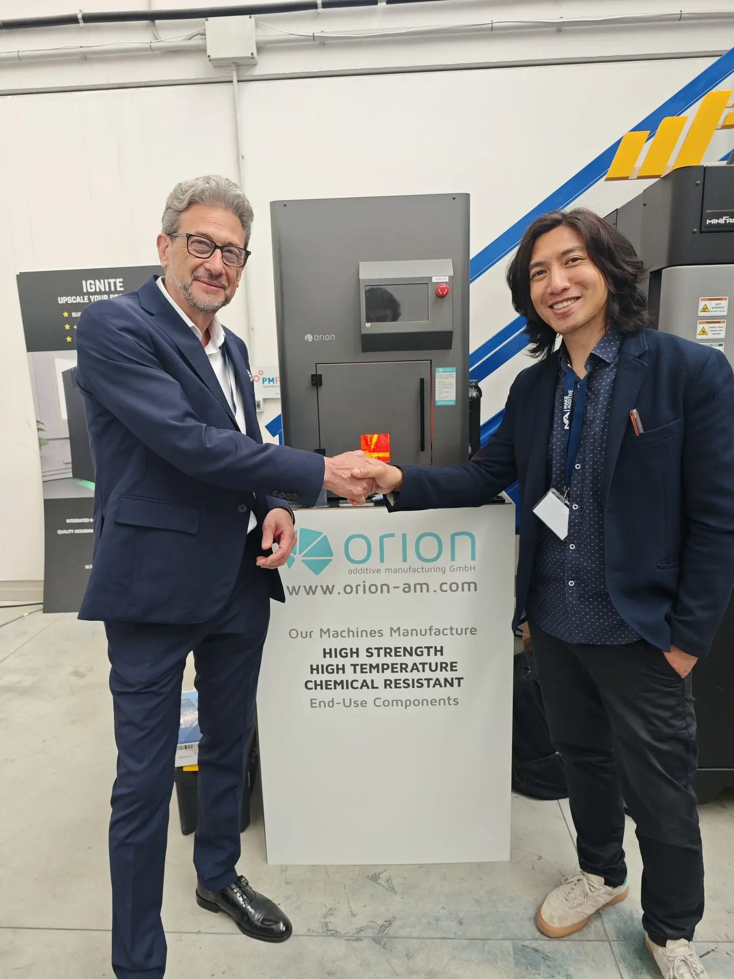 Orion AM CEO Adam Rumjahn with MakeAdditive CEO Dario Catanese at MakeAdditive's Open House 2026 in Bologna.
